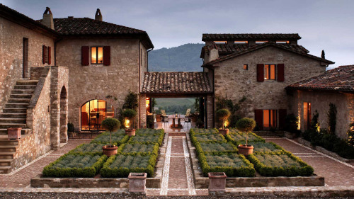 shutcherface:  gatsbyinspired:  vmagazine:  Stretching over thousands of acres of olive groves and forests in the Umbrian hills; Castello Di Reschio Luxury Villas in Umbria, Italy has been restored from secluded ancient farmhouses to contemporary guest