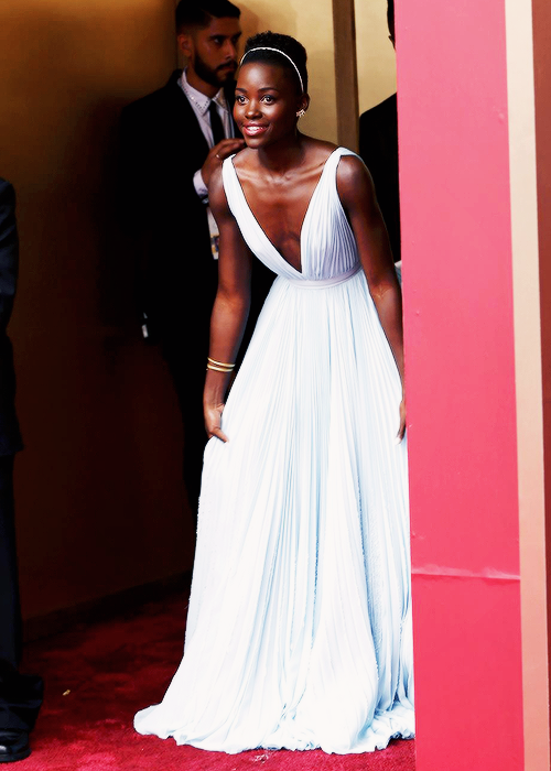 fuckyeahdarkgirls:  Oscars 2014 Fashion star of the season: Lupita chose the pale blue colour as it reminded her of Nairobi  