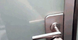 awesomephilia:  This glass door changes opacity as you lock/unlock it (via) 