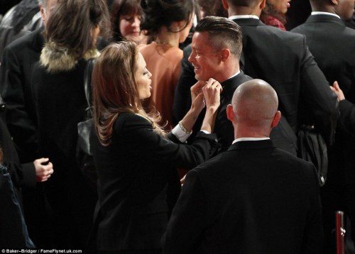 spotlightinthemedia:  She always knows how to stand out from the crowd. Looking absolutely sexy and elegant may I add, Angelina Jolie looks every bit the “Mrs Smith” character at the 2014 BAFTA awards. Brangelina in this picture a together is what