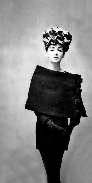 theniftyfifties - Model wearing a Balenciaga sheath, tunic and...