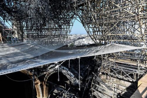 yahoonewsphotos: PHOTOS: Rebuilding Notre Dame Three months after a fire ravaged Notre-Dame cathedra