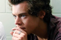 ichuggedbuttermilk:  Harry   Biting the Side of his Finger 