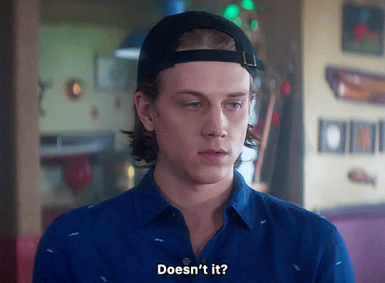 GIF FROM EPISODE 1X06 OF NANCY DREW. CLOSE-UP OF ACE AT THE CLAW. HE SAYS "DOESN'T IT?" AND BEGINS TO WALK OUT OF THE FRAME.