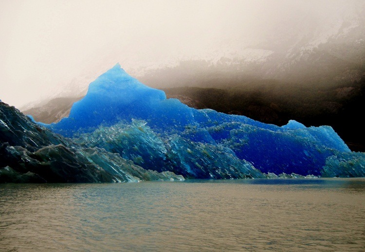 sixpenceee:  Ice absorbs every color in the spectrum except blue which causes the