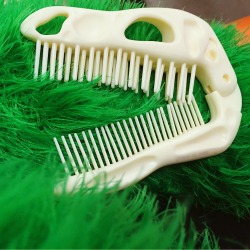 glitterghoul:Dino comb