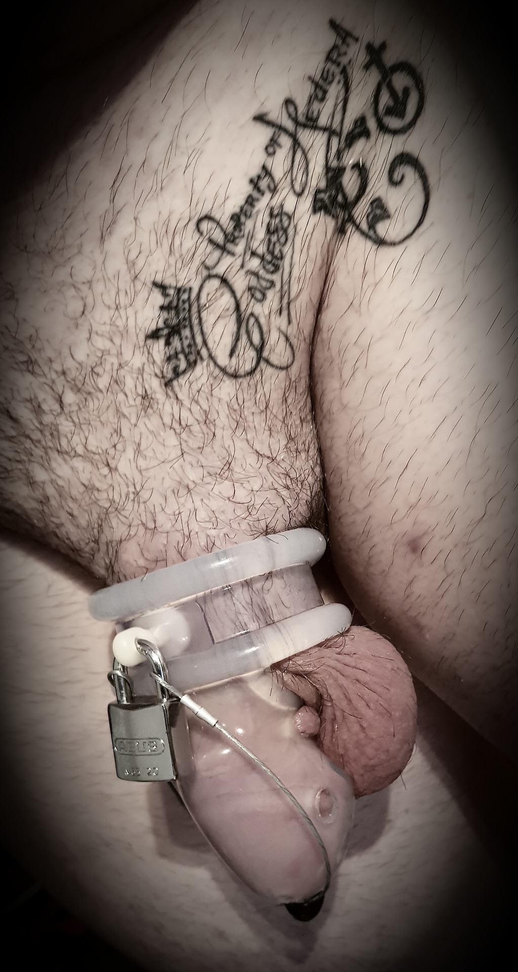 hederas-slave: Sore and secure. Locked up tight and secure with the PA cable in my