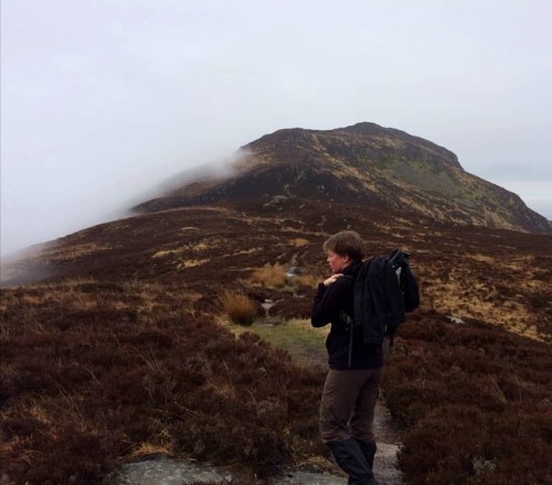 Walking towards the highest point on Holy Isle under low cloud. This place has a palpable serenity, 