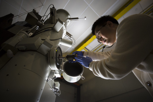 Jiseok Gim, materials science and engineering PhD candidate, demonstrates loading a sample into the 