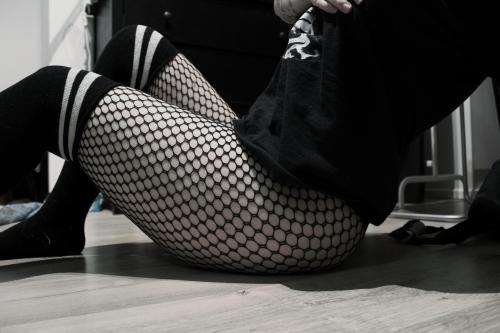 Fishnet + thigh high combo =