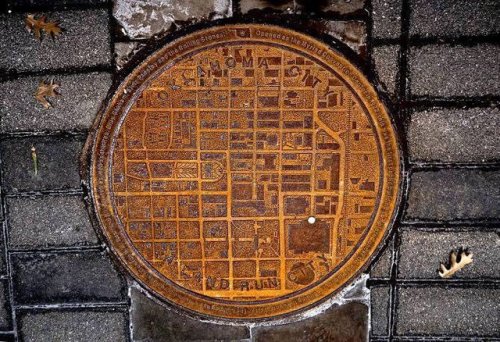 animeengineer: sixpenceee: Oklahoma Manhole Covers have a city map on it with a white dot showing wh