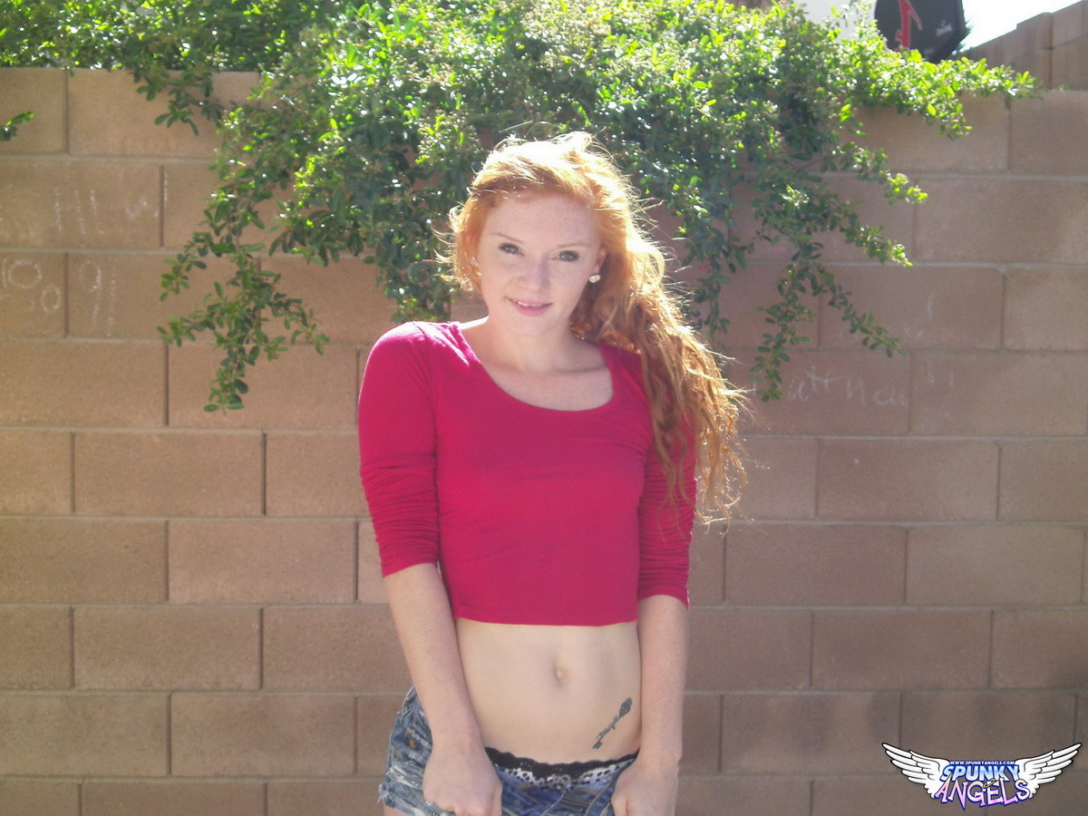 spunkyangelsgalleries:  Alex Tanner - Cute redhead teen Alex Tanner shows off her