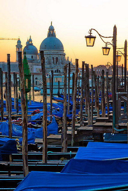 Gondolas at sunset in Venice, Italy (by anthony pappone).