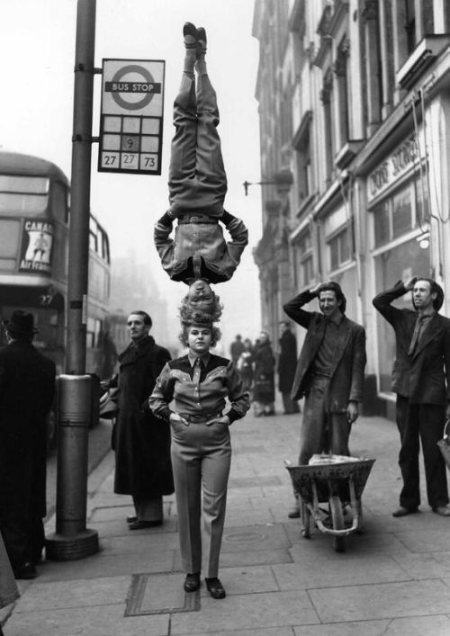 emmaklee:two members of a circus walking down a London street, 1953ph Fred Romage