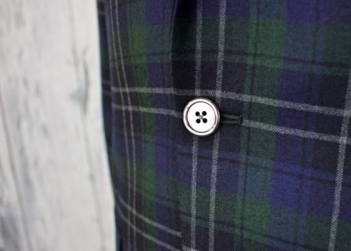 Guaranteed to turn some heads, Robert Talbott’s black watch tartan formal jacket. Grosgrain satin la