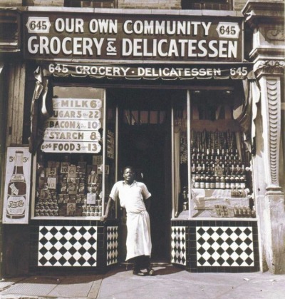 XXX atomicrobotlive:Harlem grocer standing in photo