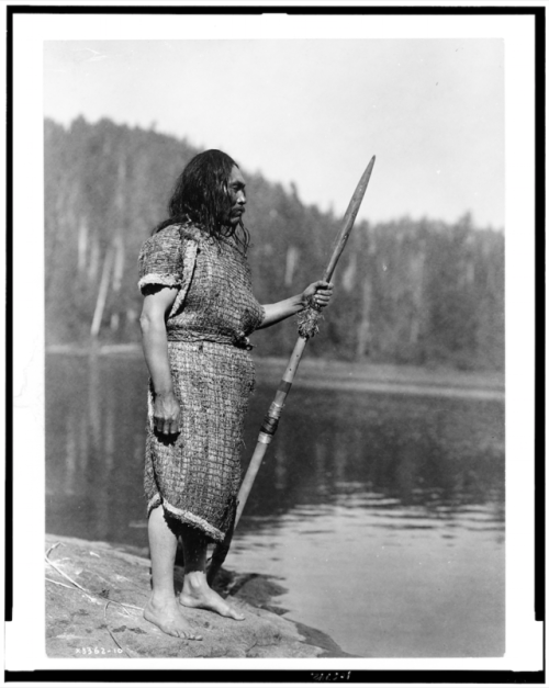 thebigkelu:Nootka Indian standing on shore with spear. - Curtis - 1910The Nootka (nut’-kah), also kn