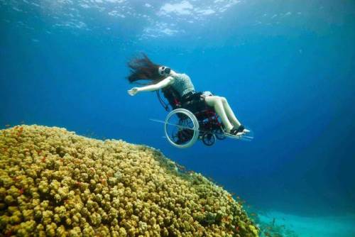 itscolossal: A Specially Adapted Underwater Wheelchair Brings Artist Sue Austin Beneath the Earth&rs