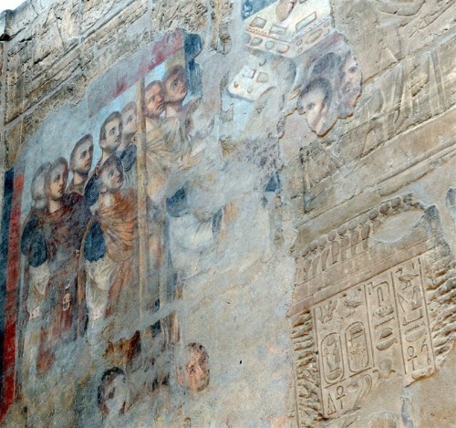 arthistoryfeed:Late Roman frescos plastered directly onto Egyptian reliefs in #Karnak.   In 323 AD, Roman emperor Constantine the Great recognised the Christian religion, and in 356 Constantius II ordered the closing of pagan temples throughout the Roman