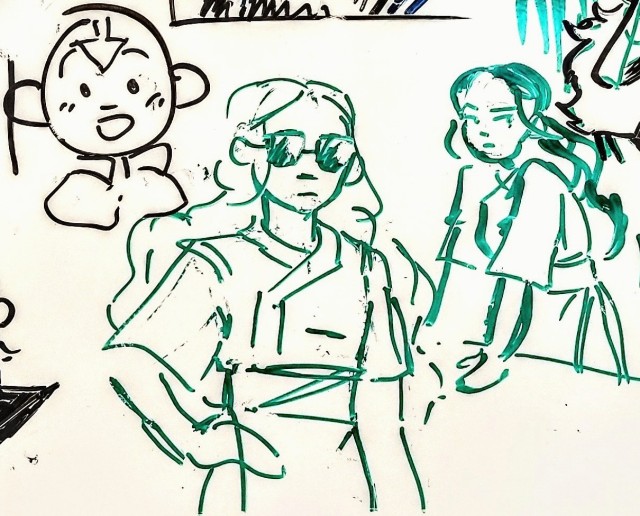 Whiteboard doodles of Aang and Katara.