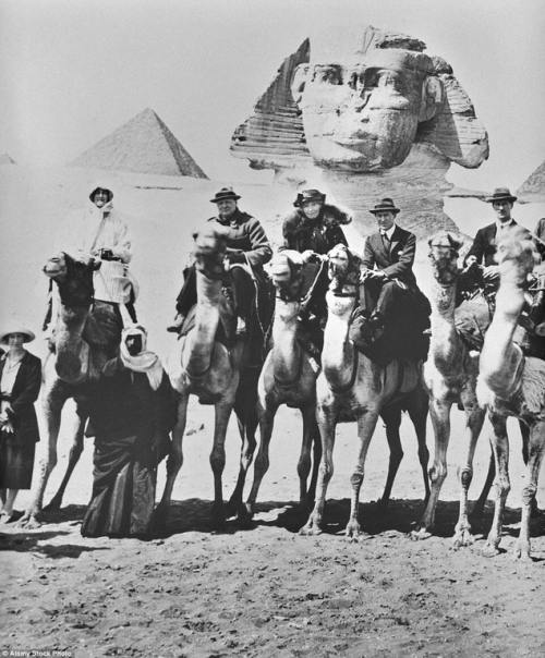 1921  Mr & Mrs Winston Churchill, T.E.Lawrence and Gertrude Bell on camels in front of the Sphin