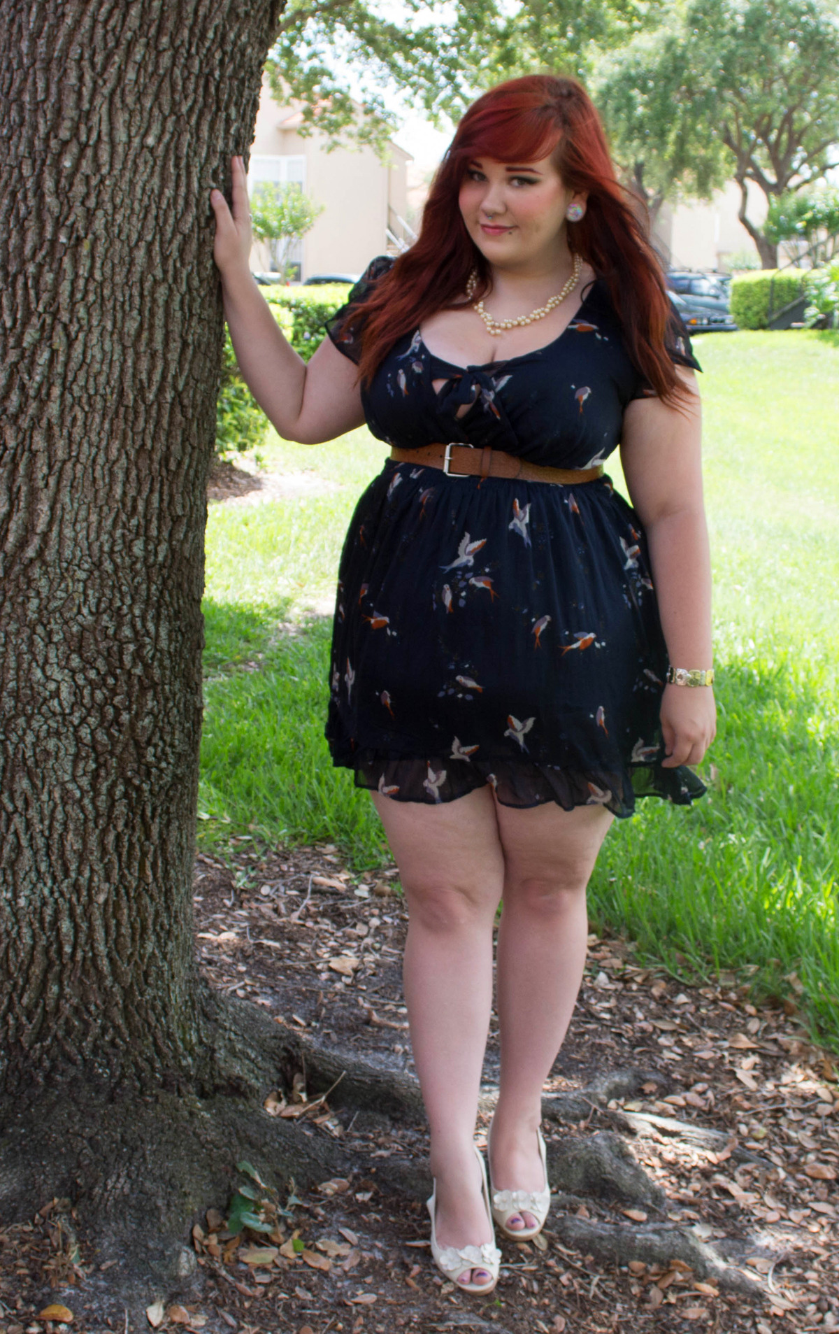 juliaporter:  I love how fluttery this dress is from the bird print to the cut of