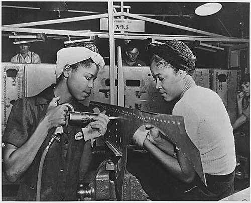 usnatarchives:LUEDELL & LAVADA THE RIVETERS Luedell Mitchell and Lavada Cherry rivet at Douglas 