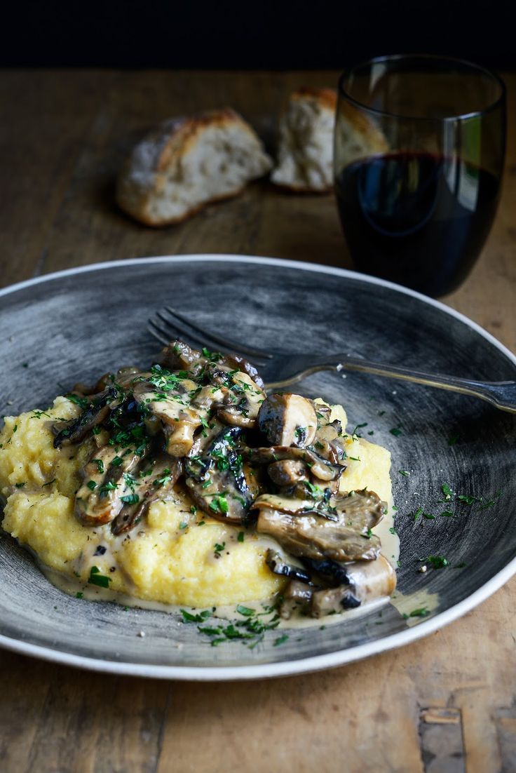 intensefoodcravings:  Creamy Mushrooms with Sherry, Garlic and Thyme on Soft Polenta