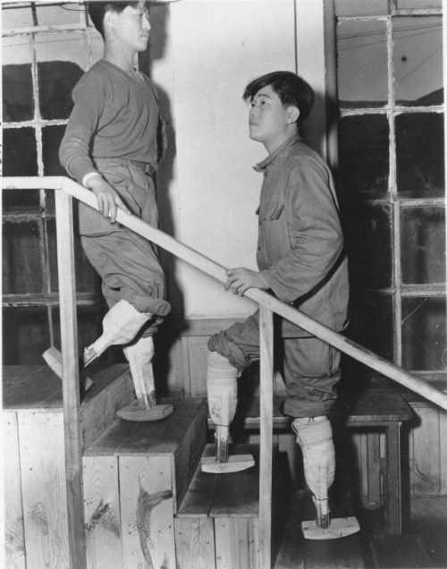 historicaltimes:  Soldiers learning to walk again with artificial limbs in Pusan, Korea. January 23,