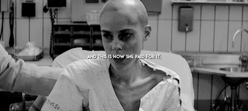 fourfinick:Her flesh shows bruises and oozing scabs. Johanna Mason. Who actually knew rebel secrets.