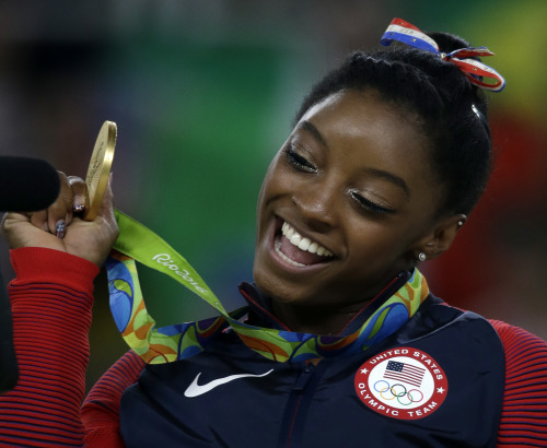 the-movemnt:  Simone Biles becomes the first adult photos