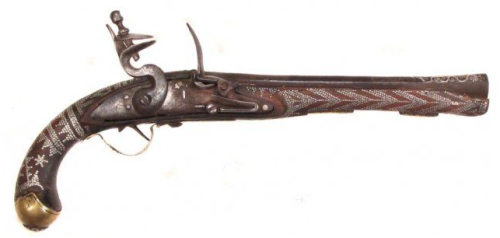 peashooter85:A lovely silver studded flintlock pistol originating from Southern India, 19th century.