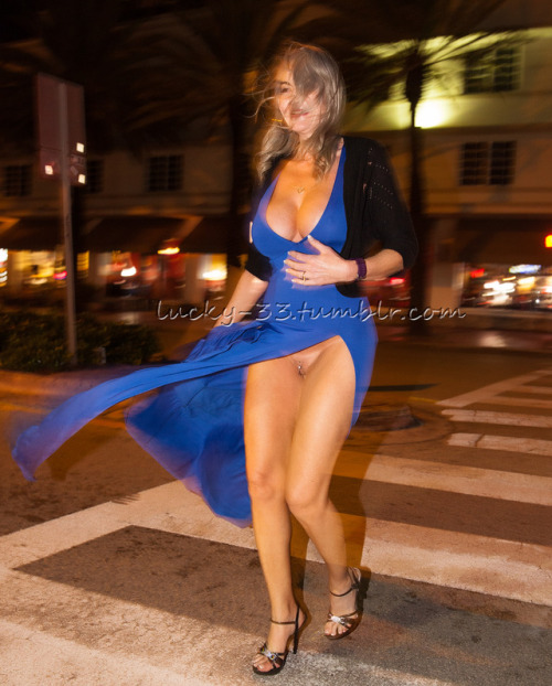 lucky-33: Jan 2017 Miami Beach, FL Just some really bad, candid photos. I was a little intoxicated and forgot to change my camera settings. I still think they are sexy as hell though. It shows just how bad the wind was whipping her dress around!  Heading