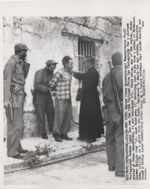 “Former Batista Army Jose Rodriguez Receives Last Rites From a Priest at Matanzas, Cuba”