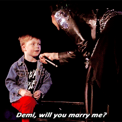 burrowjoe:  Demi Lovato getting proposed to onstage by a little boy named, Grant, on 10/11/2014. 