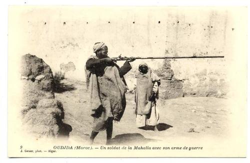 Moroccan soldier firing musket, 19th century.