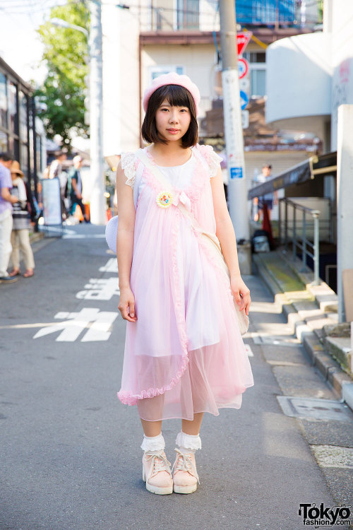 Yuuki on the street in Harajuku wearing pastel lingerie with a beret, ruffle socks, ankle boots, and