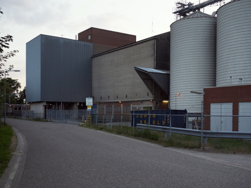 midsize factory under dusksmaller town in province of limbourg, the netherlands // 06-2020