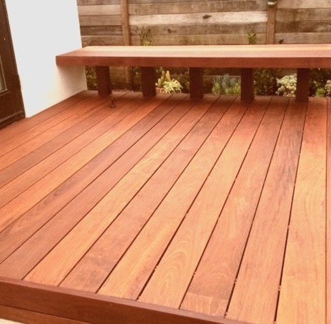 Backyard - Contemporary DeckA Small, Modern Backyard Deck Design Example Without A Cover