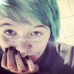 gekotztesblut:  #greenhair #greenhead #green #pierced #cheekpiercings #cheeks #dimples #dimplepiercings #septum #nostril #eskimo #verticallabret #strechedlobes #instaink #instapiercings #instagood #instashit #inked #strechedseptum