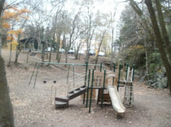dichotomized:  Maple Hill Cemetery, Huntsville, Alabama: For some unexplained reason this cemetery has a playground, and supposedly the children of the local cemetery spooks like to play here after dark. People claim to see swings moving on their own