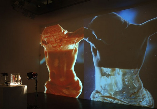 vuls: Andrei Molodkin – In God we trust (2007) video installation and mixed media