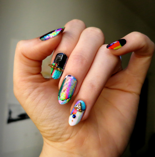 ladycrappo: DIGITAL BREAKDOWN.  In collaboration with my friend Peechiz, who does glitch art, I made some custom Appliq nail wraps (and, of course, glued some things on top of them).  I love how these came out and I’m looking forward to designing