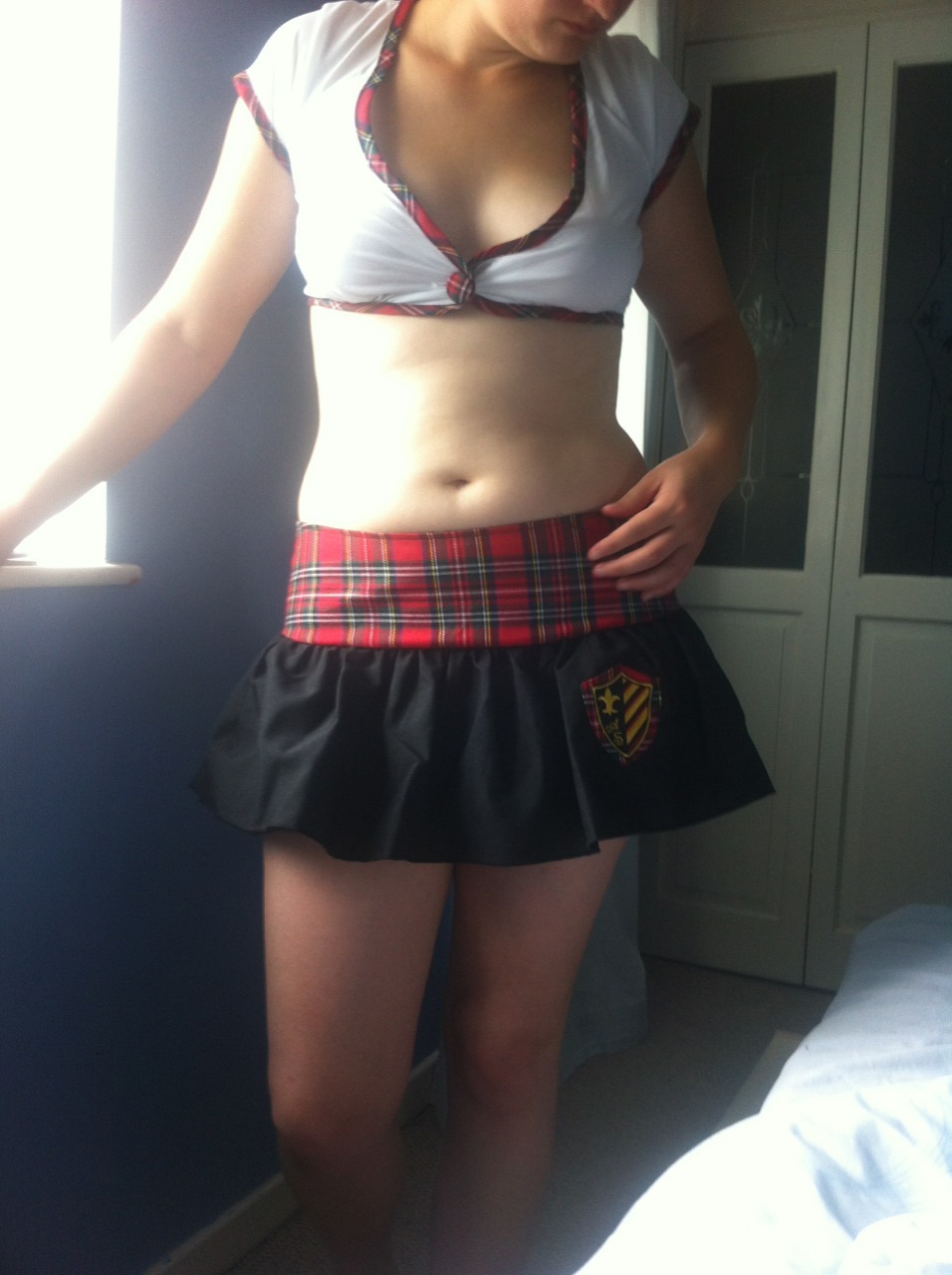 youngnsexyukcouple:  School girl out fit? Not sure whether we like it?