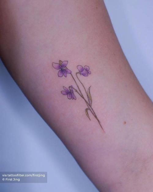 Violet flower tattoo on the ankle  Tattoogridnet