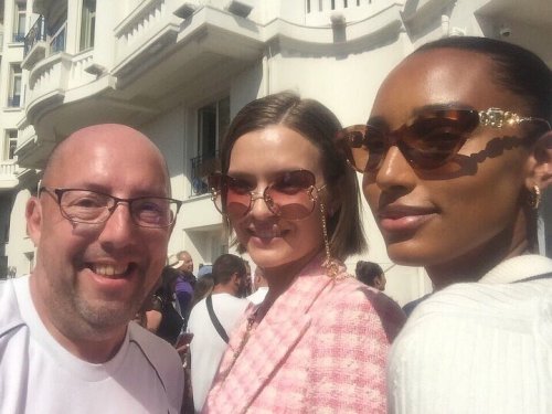 Josephine Skriver & Jasmine Tookes with a fan in Cannes, France - May 17, 2022.