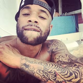 dominicanblackboy:  Sexy tatted hotboy Ivanie Murphy cute muscle tatted ass!😍  Sexy brother  mmm