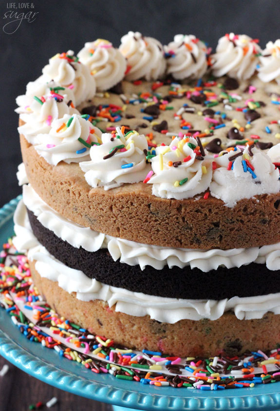 biglegwoman:  sweetoothgirl:  Ultimate Layered Chocolate Chip Cookie Cake  Someone