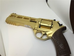 gunrunnerhell:  Gold RhinoThe Chiappa Rhino, which is based on the older Matebas, are revolvers that position the barrel at a lower axis. This reduces recoil and muzzle flip substantially. The gold finished versions were limited production run examples.