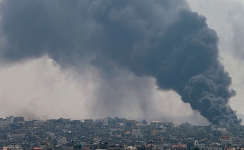 XXX fotojournalismus:  Thousands flee Gaza’s Shujaiyah after photo